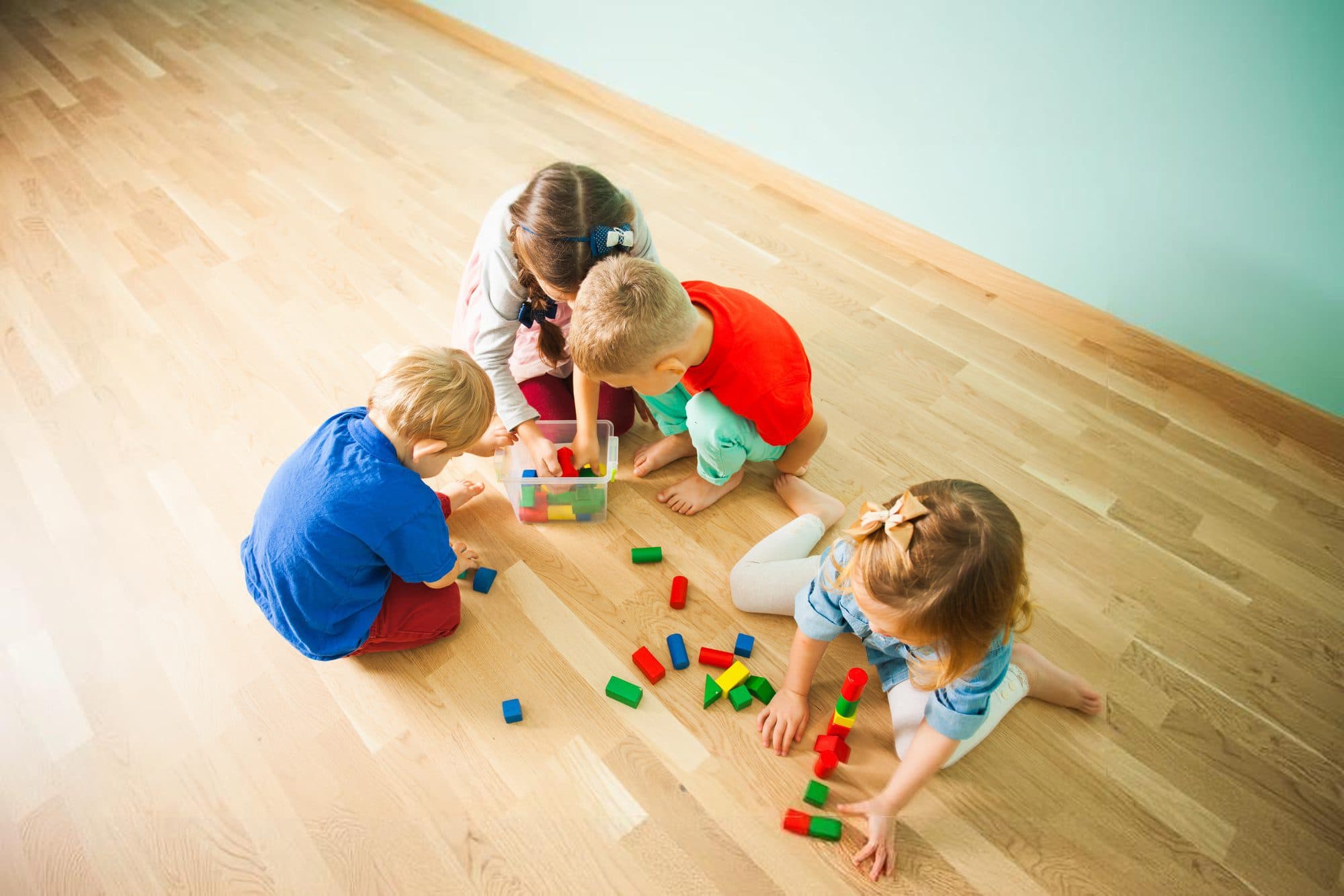 Children building with blocks together at Kid's Country
